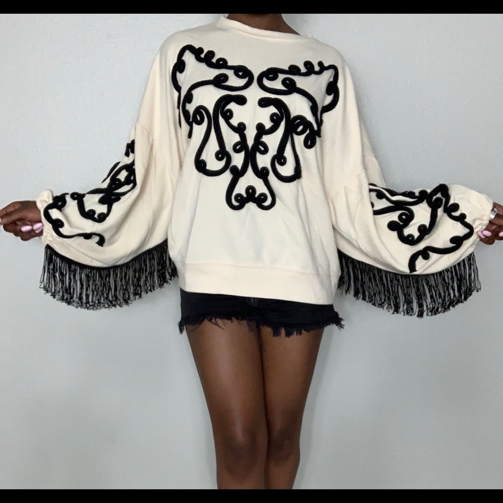 Custom fringe sweater